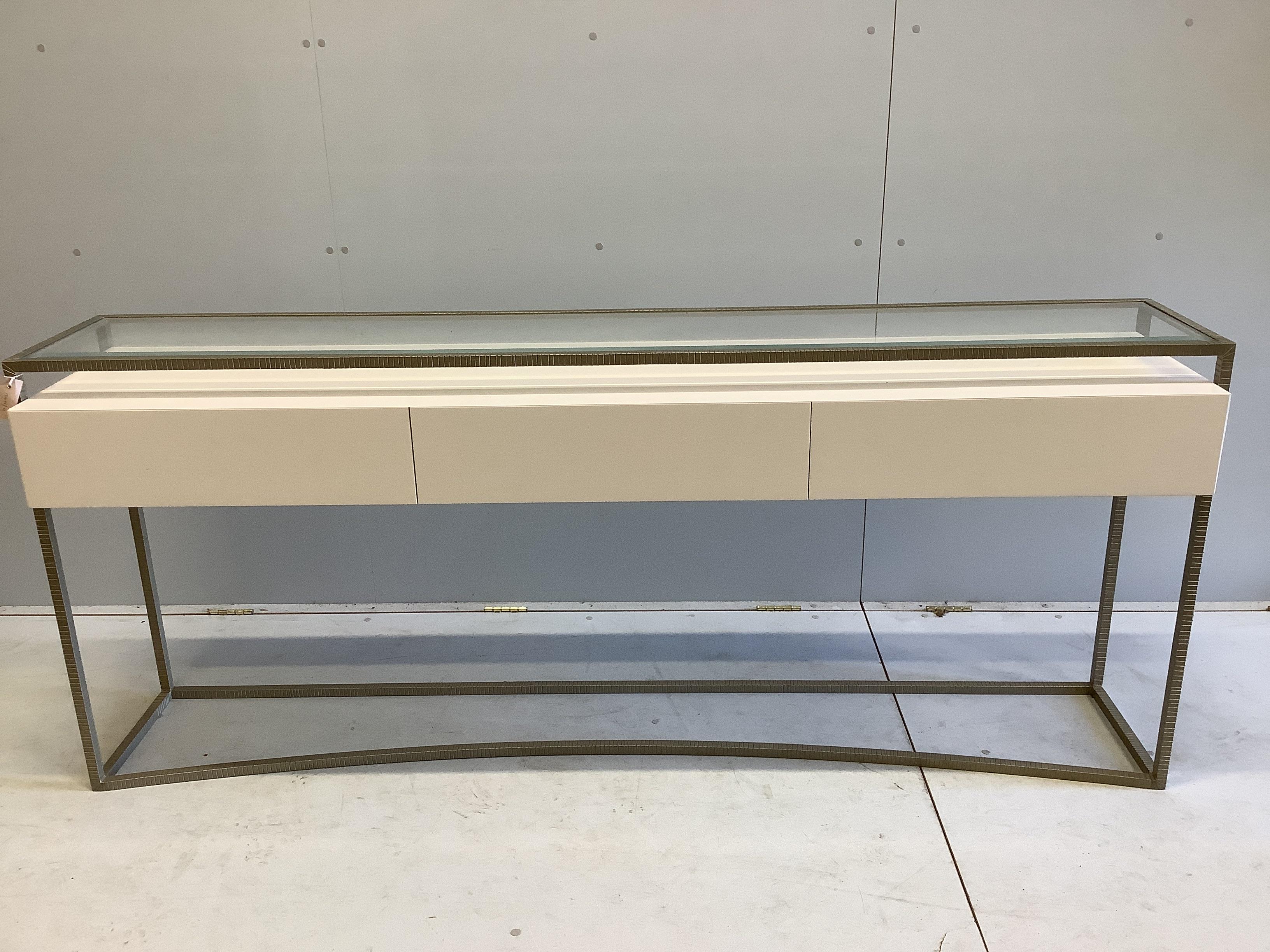 A Decorus console table with three drawers, width 200cm, depth 40cm, height 84cm